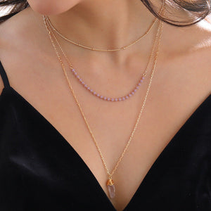 Multilayered gold necklace