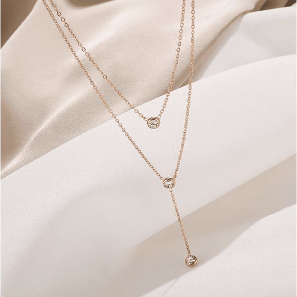 Multilayered Rose gold , necklace with Zircons